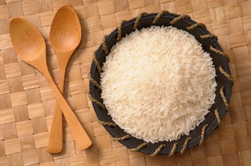 600-06553482 © Jean-Christophe Riou Model Release: No Property Release: No Overhead View of Bowl of White Rice with Wooden Spoons